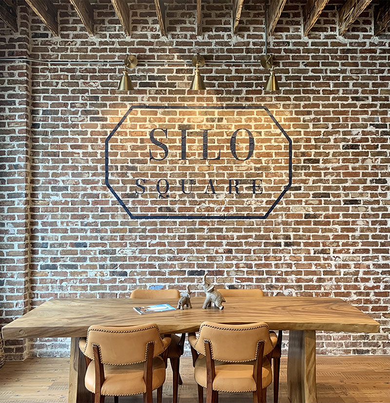 Brick wall inside office building meeting space